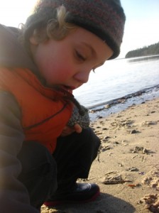 Rain - digging at the beach