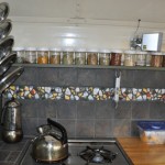 Stove, spicerack and tiled backsplash, 1984 Bluebird schoolbus